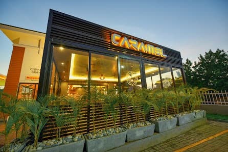 Caramel Café exterior at dusk